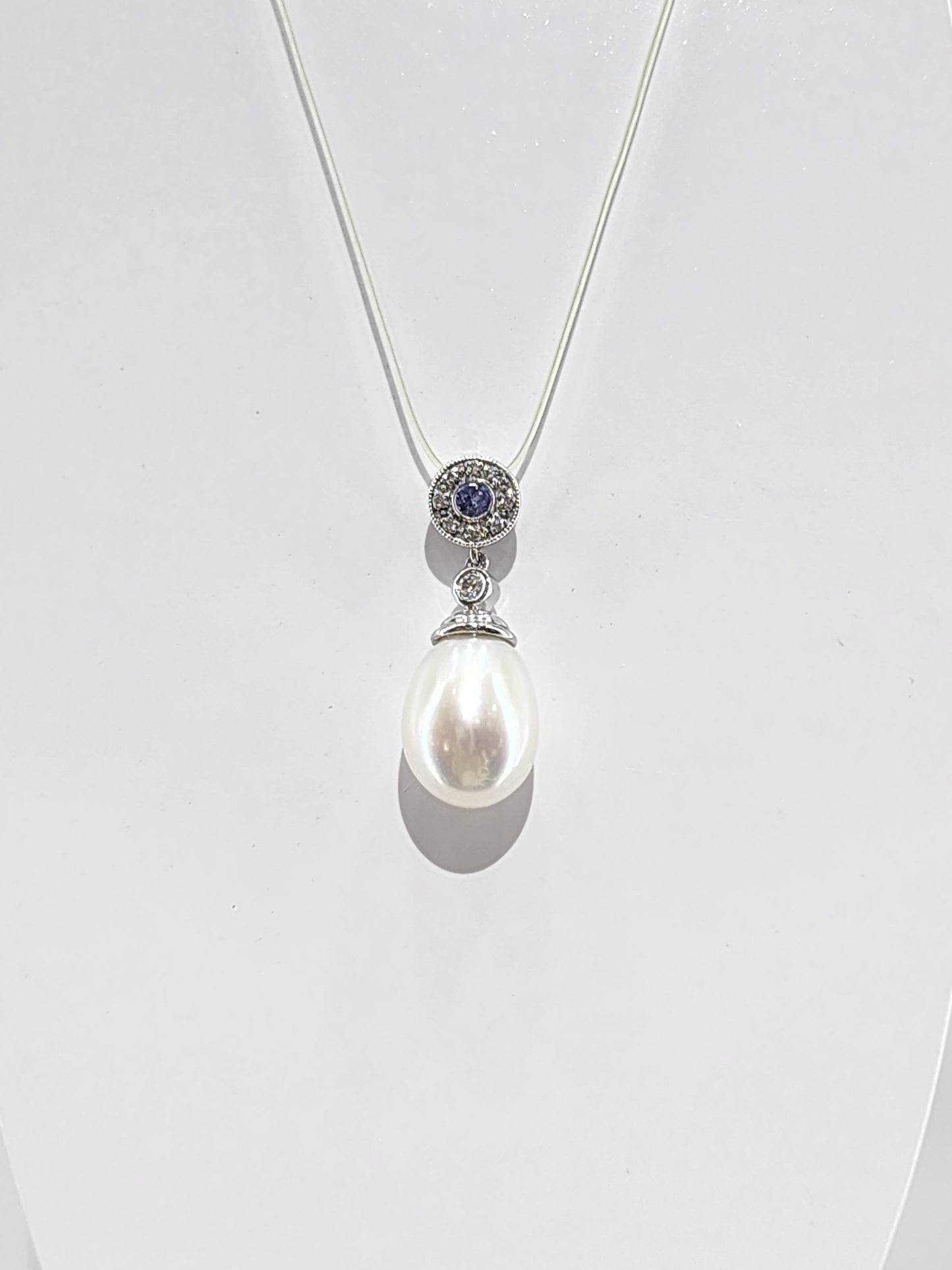 10K white gold pearl, diamond and tanzanite pendant 18347