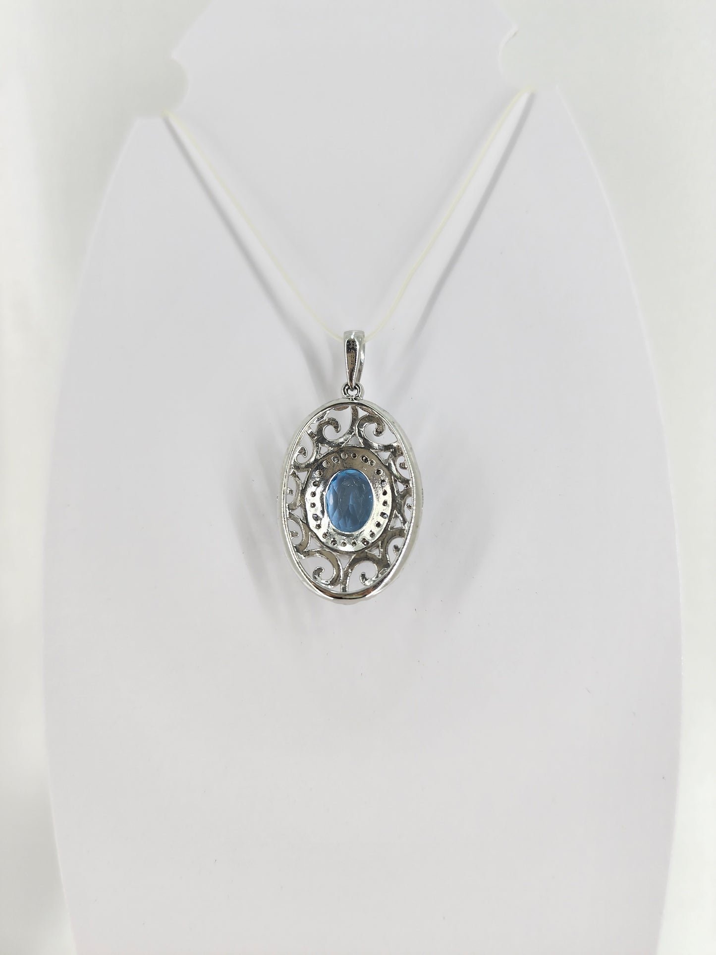 10K white gold blue topaz and diamond pendant 18332