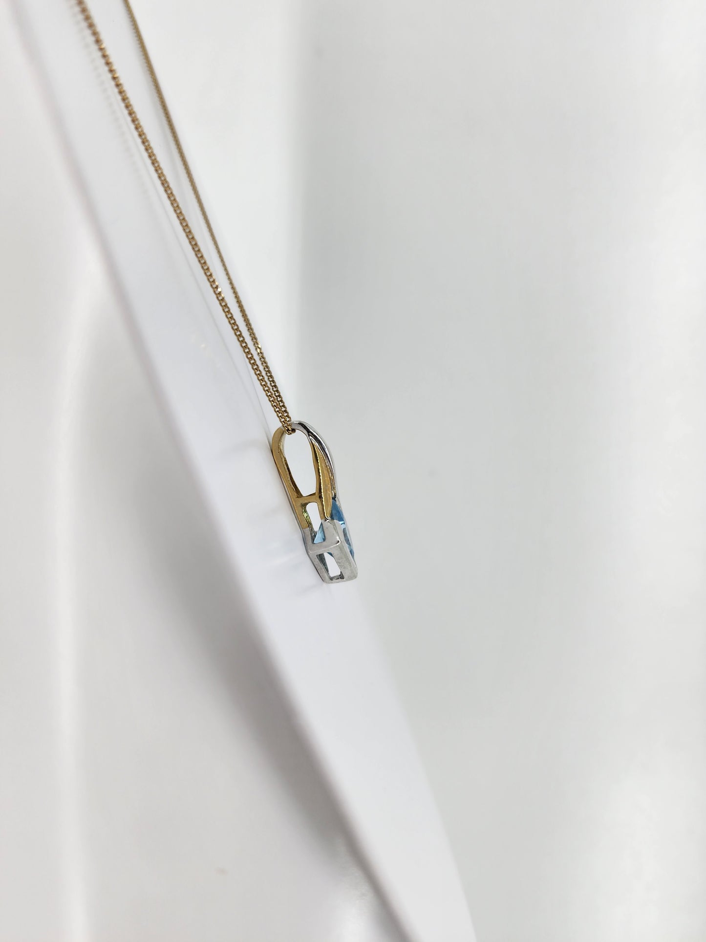10K yellow & white gold blue topaz necklace 8505