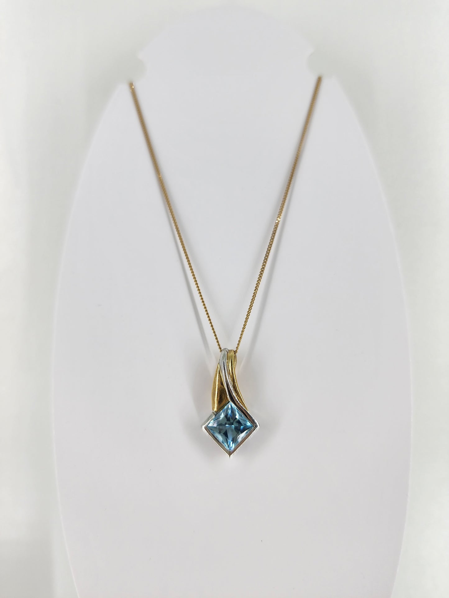 10K yellow & white gold blue topaz necklace 8505