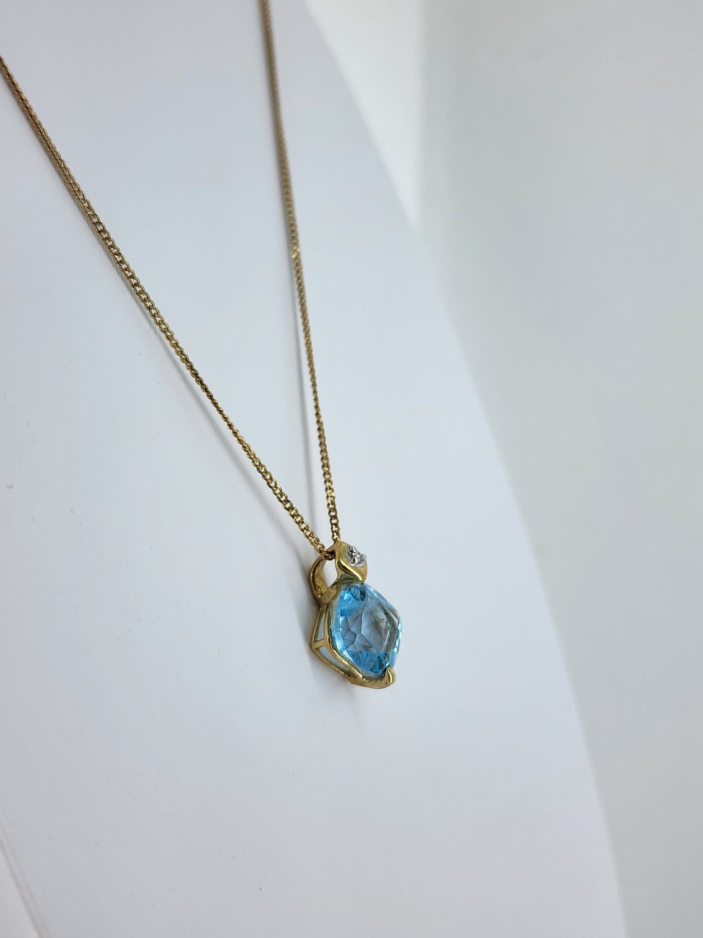 10K yellow gold diamond and blue topaz necklace 8510