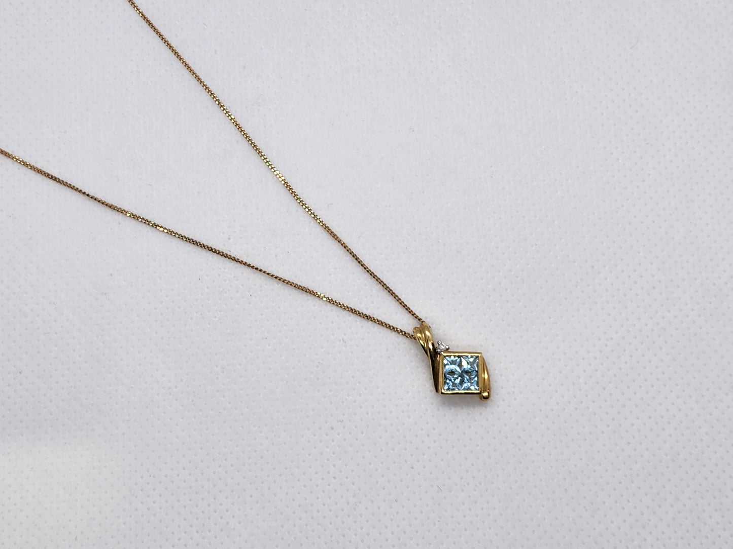 10K gold blue topaz and diamond necklace   8855